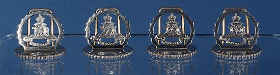 A cased set of four silver The Royal Artillery menu holders, by A. Wilcox, Height 39mm. Weight: 2.6oz/81grms